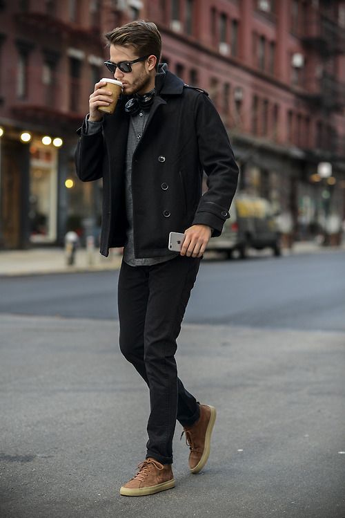 Picture Of black jeans a black coat a grey tee brown shoes