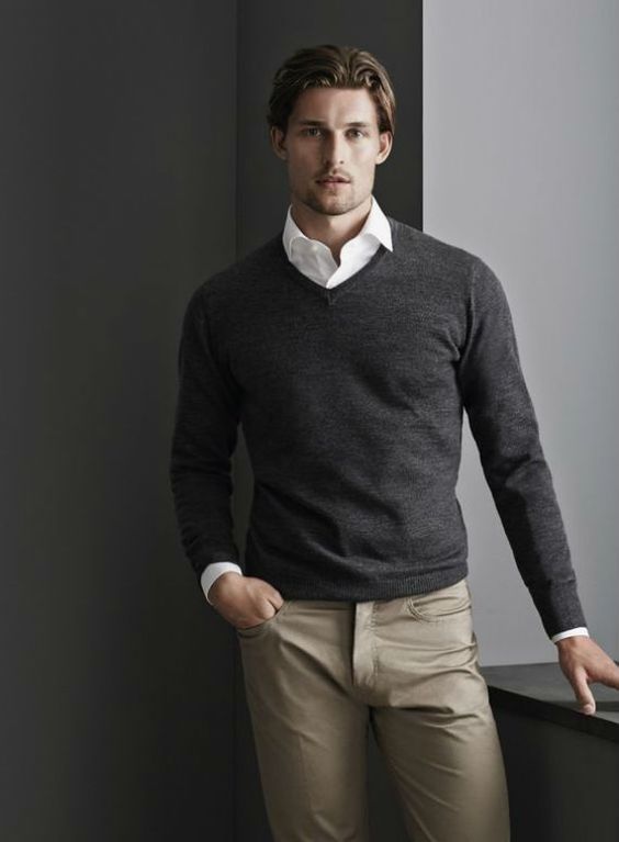 Picture Of grey pullover, a white shirt, grey pants and no tie