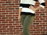 a striped top, olive green cargo pants, brown ankle booties for a casual everyday look