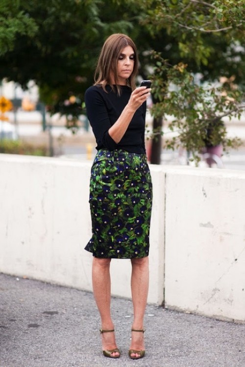 a black top with short sleeves, a dark floral pencil knee skirt and green shoes for a spring outfit