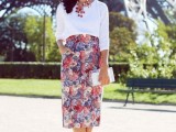 a white top, a bright floral pencil skirt, red shoes, a statement necklace and a white clutch for summer