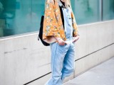 a black tee, a blue denim dungaree, a floral kimono, brown boots and a black bag for a bold spring outfit