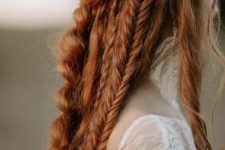 a bold boho ginger hairstyle with braids all over and a bump on top is a lovely idea for a boho bride