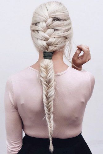 a braid with a classic part and then a fishtail version of it is a cool and catchy idea to rock