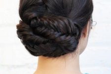 a fishtail braid low updo with a volumetric top is a cool and fresh hairstyle to rock, it looks lovely and is comfy in wearing