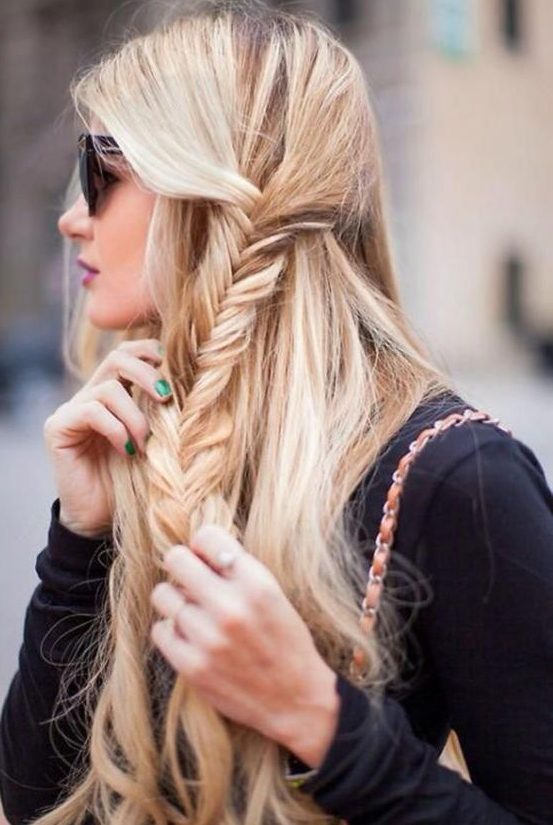a half updo with a side fishtail braid can be made right on the run, a perfect last minute hairstyle