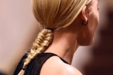 a sleek ponytail with a fishtail braid and a sleek top is a catchy and cool hairstyle idea for a modern look
