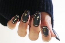 black coffin nails with gold framing and crosses are stylish, spooky and very elegant, perfect for Halloween
