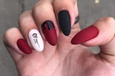 matte burgundy, black and white nails with drippings, a rose look very refined and very chic