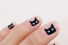 nude nails with cute black cats are an ultimately awesome solution for a Halloween party