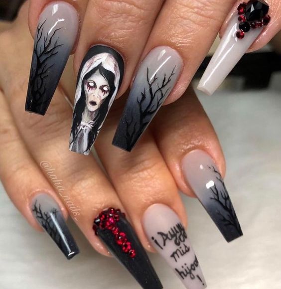 scary long nails in black, white and grey, with a scary bride, rhinestones and quotes are a real Halloween art