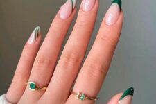 a Christmas manicure in nude, with emerald tips and green and white swirls and lines is chic and cool