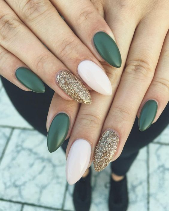 an elegant Christmas manicure with white, emerald and gold glitter nails is a chic and stylish idea for the holidays