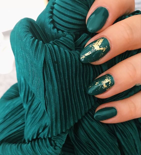 emerald Christmas nails with gold foil are amazing for the holidays, they are elegant and refined