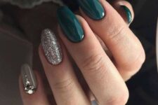 glossy hunter green, grey and silver glitter nails and an accent nail with heavy embellishments for a Christmas party