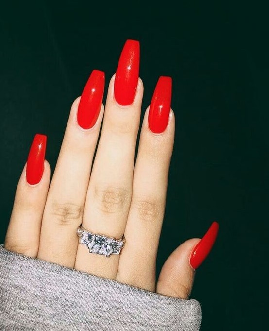long red coffin-shaped nails are amazing for Christmas and are classics on the whole, so you can worn them after, too