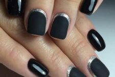matte and glossy black nails with silver moon framing are a grogeous and very sophisticated idea for NYE parties
