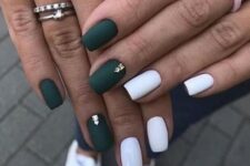 matte hunter green and white nails, with gold studs for a lovely Christmas party look