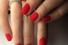 matte red nails are a hot and trnedy alternative to a usual red manicure, they look amazing at Christmas