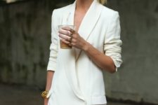 neutral-looking office outfit with a creamy blazer dress with a V-neckline and a red lip to look wow