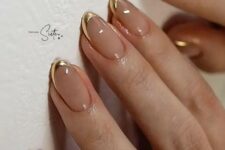 nude nails with shiny metallic gold tips look very chic, beautiful and glam and make your look wow