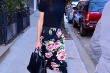 a black tee a dark floral pencil skirt, two tone shoes and a black tote for a cool spring work look