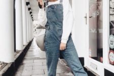 a white sweatshirt, a blue denim dungaree, white sneakers, a white bag for this spring