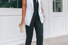 a black top, black pants, a white sleeveless blazer, blush shoes and a white bag for working in summer