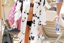 a white coverup with a black chaotic pattern is a nice pair for a black bikini or a white one