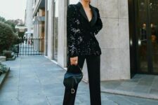 a black sequin tux plus black satin pants, hot pink shoes and a small saddle bag are a lovely NYE combo