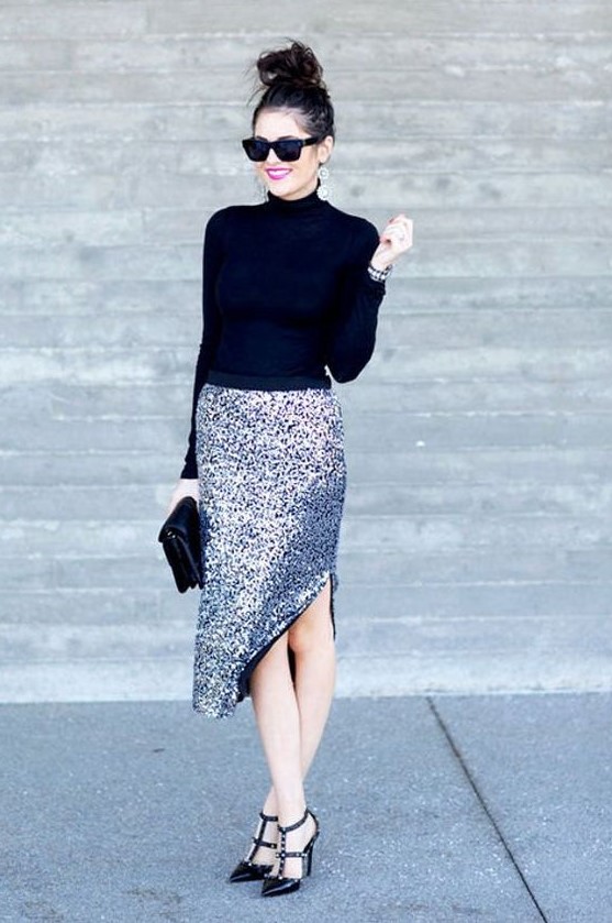 a black turtleneck, a silver sequin midi skit with a side slit, black spiked heels and a black clutch