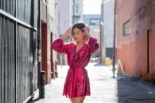 a hot pink sequin wrap mini dress with long sleeves and bow shoes with lacing up are a chic and sexy combo for NYE