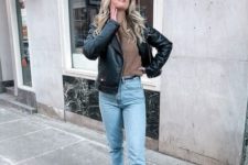 a brown top, a black leather jacket, bleached denim, snakeskin boots for this spring