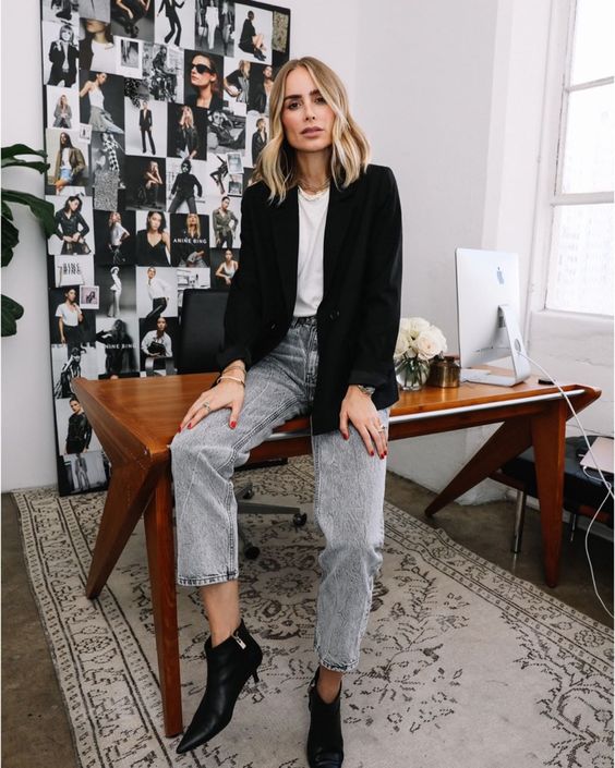 a work outfit with a white tee, grey cropped jeans, black kitten heel booties and an oversized black blazer