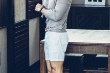 a grey long sleeve top, blue linen shorts, blue espadrilles for a stylish and relaxed seaside look