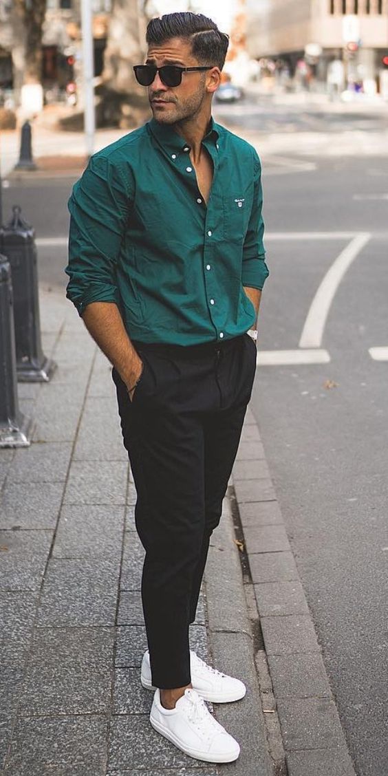a hunter green shirt, black pants, white sneakers for a casual summer work look