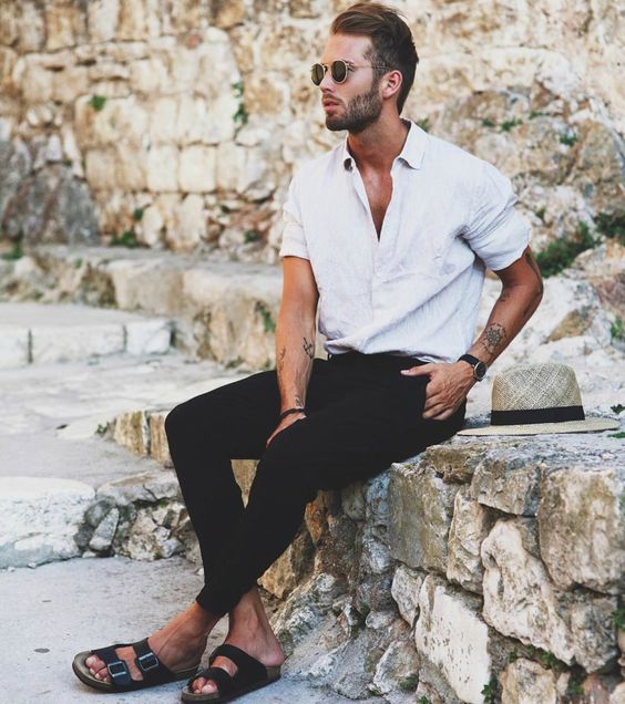 a white linen shirt, black pants, black slippers for a stylish monochromatic summer look