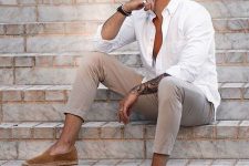 a white shirt, grey pants and brown espadrilles are a perfect summer or holiday combo