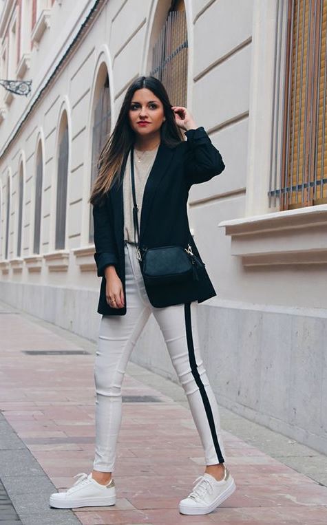 a casual look with a neutral tee, a black oversized blazer, white side strip pants, white sneakers and a black bag
