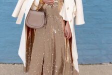 a beautiful beige sequin A-line midi skirt with a front slit is an elegant idea to go for