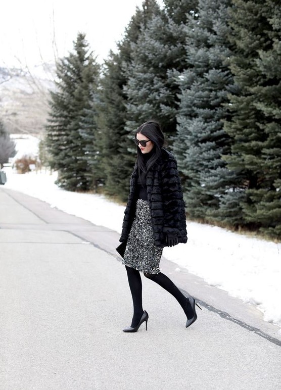 a black turtleneck, a silver sequin skirt, black tights and shoes and a faux fur coat
