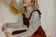 a creative party look with a silver sequin turtleneck, a rust-colored corduroy overall, yellow socks and black shoes
