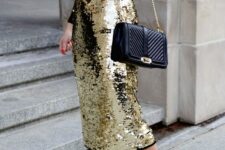 a navy turtleneck, a gold sequin pencil midi, a black bag and block heels are a chic and refined combo for the holidays