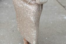 a white jumper, a gold sequin pencil maxi skirt, white spiked shoes and a creamy bag for a sophisticated holiday look