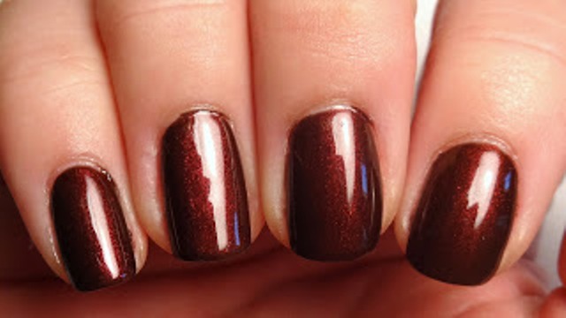 Picture Of fancy diy burgundy and bow manicure  2