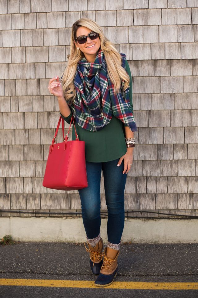 a relaxed and casual Christmas look with a green shirt, navy skinnies, hiker boots and socks, a bold plaid scarf as an accent and a red bag