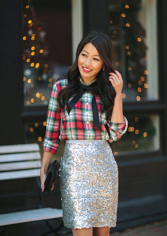a Christmas party look with a red plaid shirt, a silver sequin knee skirt, a black bow and a black clutch are a simple and cool look