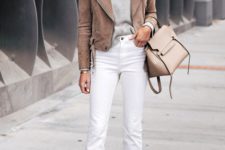 a grey top, white cropped jeans, neutral shoes, a brown cropped suede jacket and a neutral bag