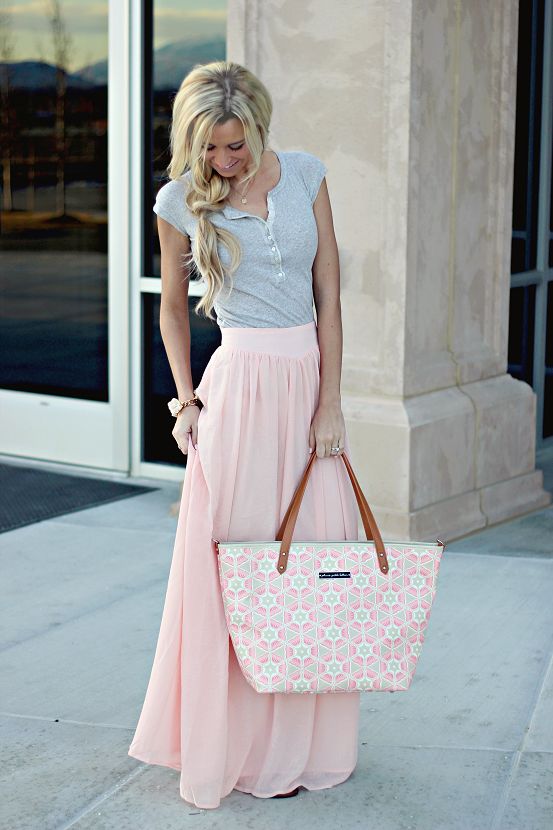 a grey button up top, a pink maxi skirt, a printed pink tote is a romantic look or every day