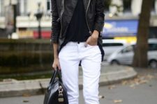 white jeans and sneakers, a black top, a black leather jacket and a black bag